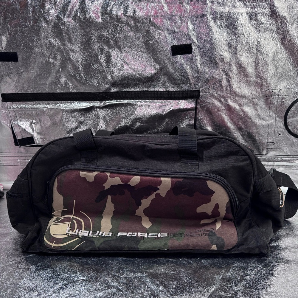Liquid force camo and black duffle bag with detachable strap